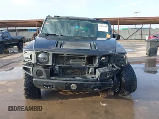 2003 Hummer H2 z VIN 5GRGN23UX3H112173, wystawiony jako IAAI lot #41093359 z przebiegiem Nie podano mil oraz . Historia ofert i sprzedaży dostępna na DreamBid. Obrazek 13.