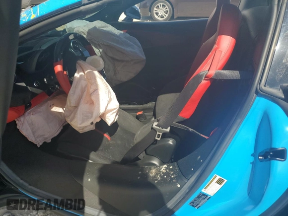 2019 McLaren 570S z VIN SBM13FAA9KW006456, wystawiony jako Copart lot #77400754 z przebiegiem Nie podano mil oraz Nie do naprawy. Historia ofert i sprzedaży dostępna na DreamBid. Obrazek 7.