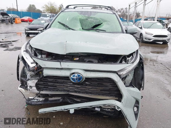 2023 Toyota RAV4 Hybrid XLE Premium with VIN JTMB6RFVXPD104349, listed as a IAAI auction lot 41730288 with 30,904 mi miles. Bid and sale history available at carsss.com. Image 12.
