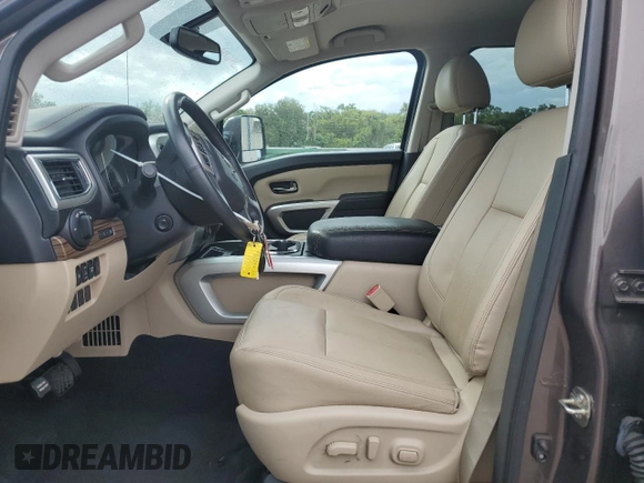 2017 Nissan Titan SV z VIN 1N6AA1E64HN517933, wystawiony jako Copart lot #72793864 z przebiegiem 60 572 mil mil oraz Szkoda całkowita • Salvage title. Historia ofert i sprzedaży dostępna na DreamBid. Obrazek 7.