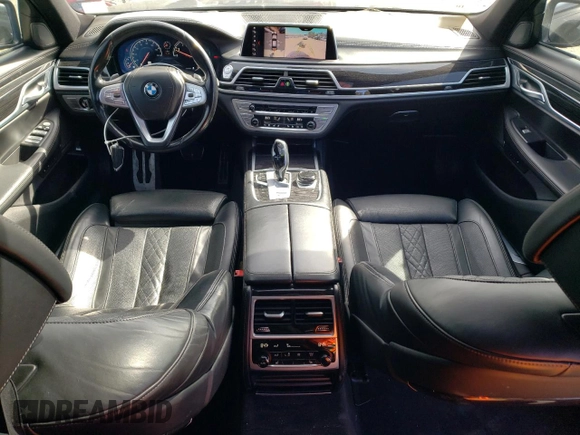 2019 BMW 7 Series 740i xDrive с VIN WBA7E4C51KGV70305, выставлен на аукционе Copart как лот 50009705 с пробегом 129 427 миль миль и Списание • Salvage title. История ставок и продаж доступна на DreamBid. Изображение 8.