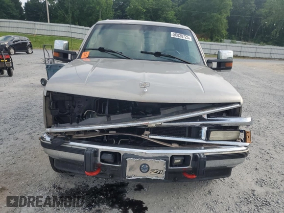2000 Chevrolet Tahoe Z71 with VIN 1GNEK13R7YR189177, listed as a Copart auction lot 56830725 with 308,270 mi miles and Salvage title. Bid and sale history available at DreamBid. Image 5.