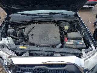 2015 Toyota Tacoma z VIN 3TMLU4EN1FM203143, wystawiony jako IAAI lot #42445912 z przebiegiem 57 444 mil mil oraz . Historia ofert i sprzedaży dostępna na DreamBid. Obrazek 10.