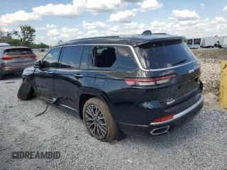 2023 Jeep Grand Cherokee Summit Reserve with VIN 1C4RJKEG5P8853916, listed as a Copart auction lot 52691735 with 18,899 mi miles and Salvage title. Bid and sale history available at DreamBid. Image 2.
