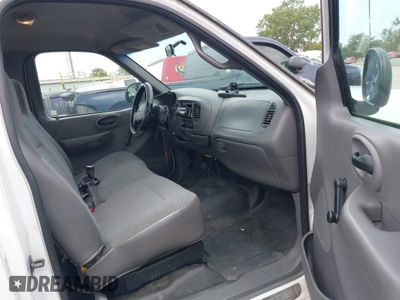 1999 Ford F-150 with VIN 1FTRF17W4XNC25668, listed as a IAAI auction lot 42731954 with 189,437 mi miles and . Bid and sale history available at DreamBid. Image 5.