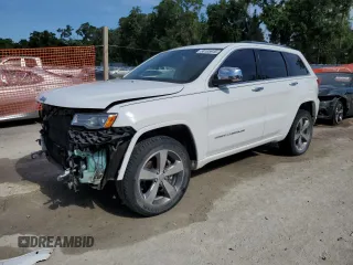 2015 Jeep Grand Cherokee Overland z VIN 1C4RJFCG6FC237356, wystawiony jako Copart lot #58195945 z przebiegiem 126 928 mil mil oraz Szkoda całkowita • Salvage title. Historia ofert i sprzedaży dostępna na DreamBid. Obrazek 1.