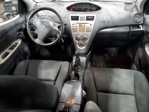 2009 Toyota Yaris with VIN JTDBT903991315725, listed as a Copart auction lot 52566735 with 177,044 mi miles and Salvage Title. Bid and sale history available at DreamBid. Image 8.