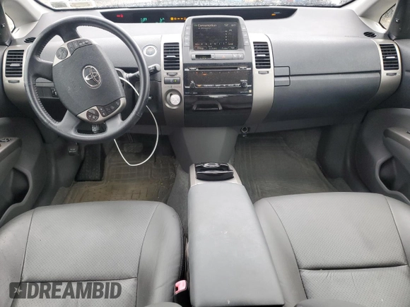 2007 Toyota Prius с VIN JTDKB20U777088175, выставлен на аукционе Copart как лот 55884935 с пробегом 87 116 миль миль и Чистый • Clean title. История ставок и продаж доступна на DreamBid. Изображение 8.