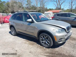 2011 BMW X5 35i with VIN 5UXZV4C57BL415565, listed as a IAAI auction lot 41864490 with 176,458 mi miles. Bid and sale history available at carsss.com. Image 1.