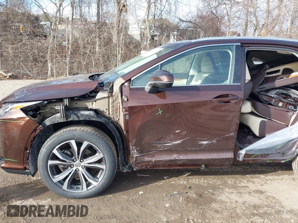 2017 Lexus RX 350 z VIN 2T2ZZMCA8HC060632, wystawiony jako IAAI lot #41334535 z przebiegiem 41 592 mil mil oraz . Historia ofert i sprzedaży dostępna na DreamBid. Obrazek 6.