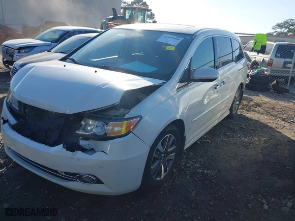 2015 Honda Odyssey Touring Elite with VIN 5FNRL5H90FB001643, listed as a IAAI auction lot 41487890 with NaN miles. Bid and sale history available at carsss.com. Image 2.
