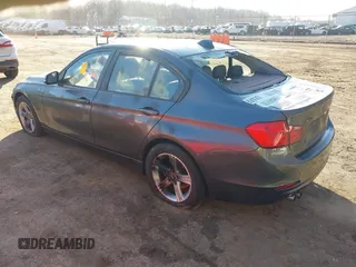 2015 BMW 3 Series 328i xDrive with VIN WBA3B5G55FNS19437, listed as a IAAI auction lot 41765832 with 137,993 mi miles. Bid and sale history available at carsss.com. Image 3.