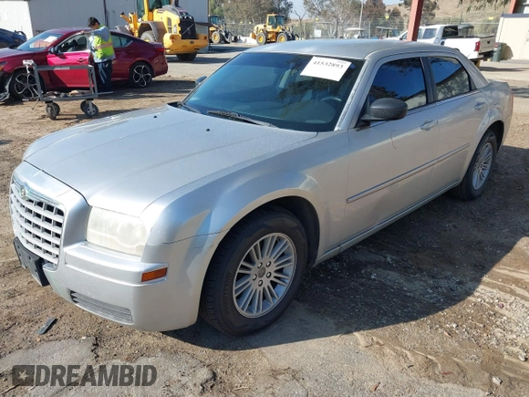 2009 Chrysler 300 LX with VIN 2C3KA43D29H528728, listed as a IAAI auction lot 41532893 with 95,077 mi miles. Bid and sale history available at carsss.com. Image 2.