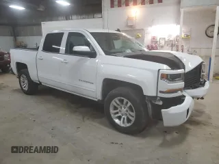 2018 Chevrolet Silverado 1500 LT with VIN 3GCUKRECXJG118122, listed as a Copart auction lot 47293595 with 97,047 mi miles and Salvage Title. Bid and sale history available at DreamBid. Image 4.