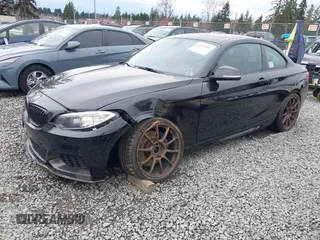 2015 BMW 2 Series M235i with VIN WBA1J7C55FV358527, listed as a IAAI auction lot 41839031 with 81,900 mi miles and . Bid and sale history available at carsss.com. Image 2.