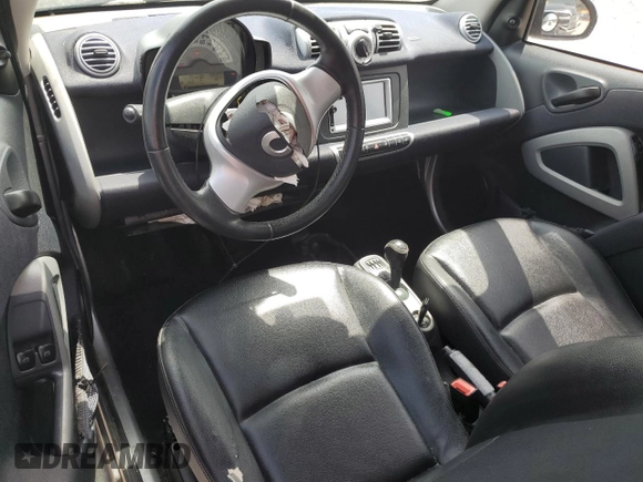 2015 Smart fortwo Passion с VIN WMEEJ3BA6FK807938, выставлен на аукционе Copart как лот 53860475 с пробегом 77 748 миль миль и Списание • Salvage title. История ставок и продаж доступна на DreamBid. Изображение 8.