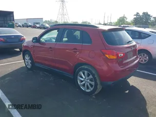 2014 Mitsubishi Outlander SE z VIN 4A4AP4AU7EE014439, wystawiony jako IAAI lot #42026513 z przebiegiem 70 963 mil mil oraz . Historia ofert i sprzedaży dostępna na DreamBid. Obrazek 3.