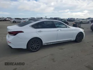 2018 Genesis G80 Sport with VIN KMHGN4JB7JU241017, listed as a Copart auction lot 52548865 with 90,560 mi miles and Salvage title. Bid and sale history available at DreamBid. Image 3.