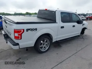 2018 Ford F-150 XL with VIN 1FTEW1E54JFB51565, listed as a IAAI auction lot 41942276 with 131,864 mi miles. Bid and sale history available at carsss.com. Image 4.