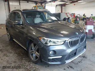 2016 BMW X1 xDrive28i with VIN WBXHT3C3XGP885359, listed as a IAAI auction lot 41743616 with NaN miles. Bid and sale history available at carsss.com. Image 1.