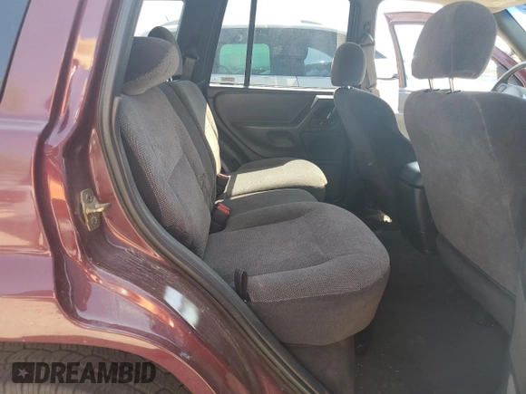 2000 Jeep Grand Cherokee Laredo with VIN 1J4G248S1YC407769, listed as a Copart auction lot 61653545 with 188,882 mi miles and Salvage title. Bid and sale history available at DreamBid. Image 11.