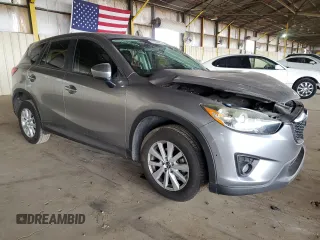 2014 Mazda CX-5 Touring z VIN JM3KE2CY7E0349484, wystawiony jako Copart lot #51188665 z przebiegiem 175 131 mil mil oraz Szkoda całkowita • Salvage title. Historia ofert i sprzedaży dostępna na DreamBid. Obrazek 4.