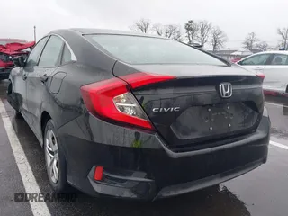 2018 Honda Civic LX with VIN 2HGFC2F54JH548274, listed as a IAAI auction lot 41864457 with 60,905 mi miles and . Bid and sale history available at DreamBid. Image 3.