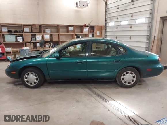 1996 Ford Taurus GL z VIN 1FALP52U5TG110582, wystawiony jako IAAI lot #40858639 z przebiegiem 57 965 mil mil oraz . Historia ofert i sprzedaży dostępna na DreamBid. Obrazek 14.
