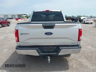 2015 Ford F-150 XL with VIN 1FTEW1CF3FKD17617, listed as a IAAI auction lot 41976415 with 216,415 mi miles and . Bid and sale history available at DreamBid. Image 16.