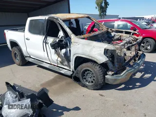 2021 GMC Sierra 1500 SLT z VIN 3GTU9DED7MG400598, wystawiony jako IAAI lot #41670908 z przebiegiem Nie podano mil oraz . Historia ofert i sprzedaży dostępna na DreamBid. Obrazek 1.