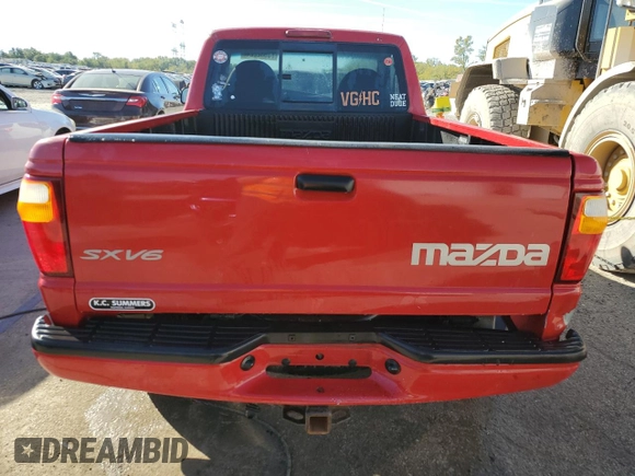 2001 Mazda B-Series Truck DS z VIN 4F4YR12U31TM27467, wystawiony jako Copart lot #73532224 z przebiegiem 89 270 mil mil oraz Szkoda całkowita • Salvage title. Historia ofert i sprzedaży dostępna na DreamBid. Obrazek 6.