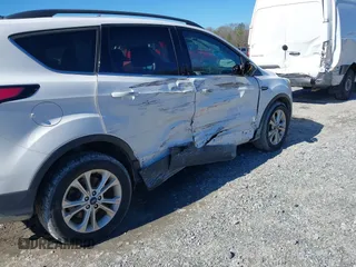 2017 Ford Escape SE with VIN 1FMCU0GD5HUB96432, listed as a IAAI auction lot 38731188 with 94,473 mi miles. Bid and sale history available at carsss.com. Image 6.