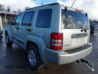 2010 Jeep Liberty Sport with VIN 1J4PN2GK0AW153442, listed as a IAAI auction lot 41732415 with 206,834 mi miles. Bid and sale history available at carsss.com. Image 3.