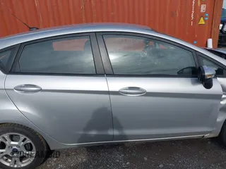 2014 Ford Fiesta SE with VIN 3FADP4EJ0EM215958, listed as a IAAI auction lot 42001168 with 115,231 mi miles and . Bid and sale history available at DreamBid. Image 13.