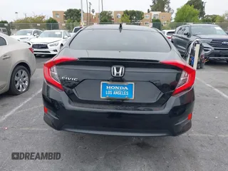 2016 Honda Civic Sedan EX-T with VIN 2HGFC1F34GH645220, listed as a IAAI auction lot 42043630 with 55,301 mi miles. Bid and sale history available at carsss.com. Image 16.