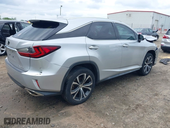 2016 Lexus RX 350 z VIN 2T2ZZMCA5GC002315, wystawiony jako IAAI lot #42107312 z przebiegiem 156 339 mil mil oraz . Historia ofert i sprzedaży dostępna na DreamBid. Obrazek 4.