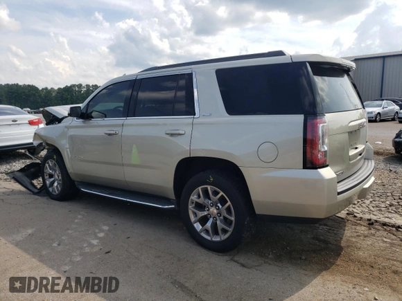 2015 GMC Yukon SLE with VIN 1GKS1AKCXFR684096, listed as a Copart auction lot 58341364 with 0 mi miles and Salvage Title. Bid and sale history available at carsss.com. Image 2.