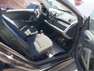2015 Smart fortwo Passion z VIN WMEEJ3BA0FK812651, wystawiony jako IAAI lot #42063112 z przebiegiem 25 270 mil mil oraz . Historia ofert i sprzedaży dostępna na DreamBid. Obrazek 5.