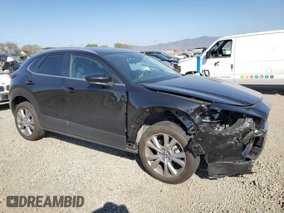2023 Mazda CX-30 S Carbon Edition with VIN 3MVDMBCM8PM567157, listed as a Copart auction lot 46954865 with 20,038 mi miles and Salvage Title. Bid and sale history available at DreamBid. Image 4.