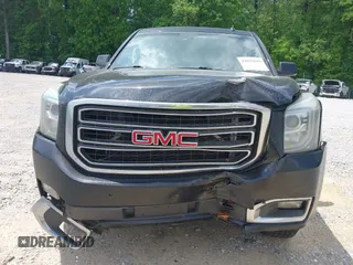 2015 GMC Yukon SLT with VIN 1GKS2BKC5FR275085, listed as a IAAI auction lot 42025693 with Not Provided miles. Bid and sale history available at carsss.com. Image 12.