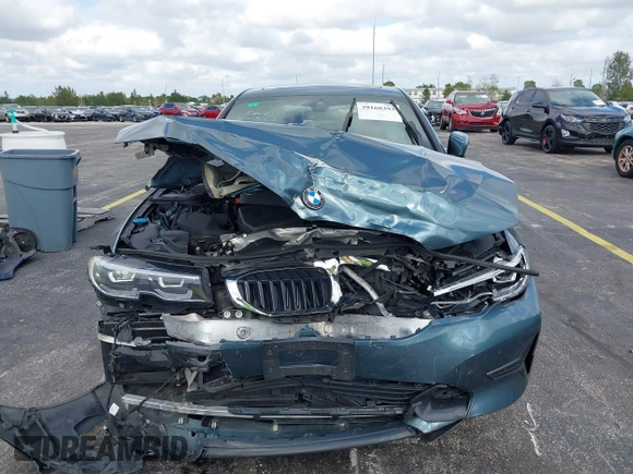 2020 BMW 3 Series 330i xDrive with VIN 3MW5R7J03L8B09157, listed as a IAAI auction lot 39168393 with 69,052 mi miles. Bid and sale history available at carsss.com. Image 6.