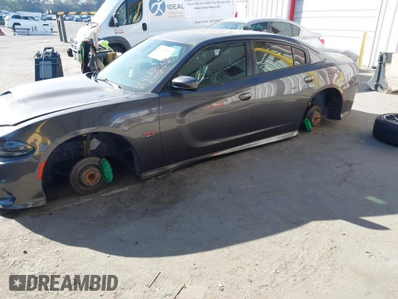 2019 Dodge Charger Scat Pack with VIN 2C3CDXGJ2KH564051, listed as a IAAI auction lot 41255283 with 64,687 mi miles and . Bid and sale history available at DreamBid. Image 17.