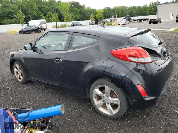 2012 Hyundai Veloster w/Black Int with VIN KMHTC6AD8CU027450, listed as a Copart auction lot 63756415 with 89,037 mi miles and Salvage title. Bid and sale history available at DreamBid. Image 2.