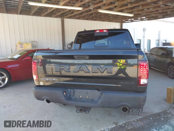 2018 Ram 1500 Rebel with VIN 1C6RR7YT4JS204186, listed as a IAAI auction lot 42668658 with 96,025 mi miles and . Bid and sale history available at DreamBid. Image 16.