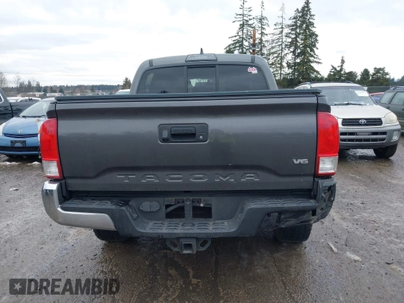 2017 Toyota Tacoma SR5 with VIN 3TMAZ5CN5HM038170, listed as a IAAI auction lot 41588399 with 152,469 mi miles. Bid and sale history available at carsss.com. Image 16.