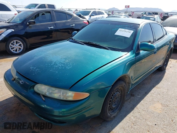1999 Oldsmobile Alero GL z VIN 1G3NL52T0XC354966, wystawiony jako IAAI lot #42259258 z przebiegiem Nie podano mil oraz . Historia ofert i sprzedaży dostępna na DreamBid. Obrazek 6.