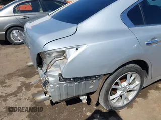 2013 Nissan Maxima SV with VIN 1N4AA5AP4DC828945, listed as a IAAI auction lot 41995127 with 169,754 mi miles and . Bid and sale history available at DreamBid. Image 6.
