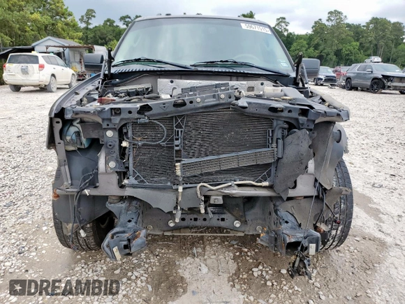 2014 Ford Expedition XLT with VIN 1FMJU1H54EEF41878, listed as a Copart auction lot 59671515 with 95,082 mi miles and Salvage title. Bid and sale history available at DreamBid. Image 5.