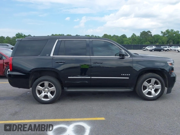 2015 Chevrolet Tahoe LT with VIN 1GNSCBKC4FR145119, listed as a IAAI auction lot 42309931 with 99,408 mi miles and . Bid and sale history available at DreamBid. Image 13.
