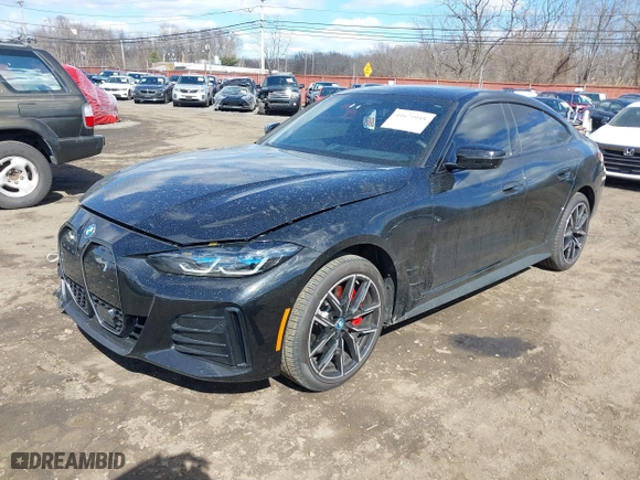 2024 BMW i4 xDrive40 with VIN WBY83FB04RFT19615, listed as a IAAI auction lot 41679918 with 3,883 mi miles. Bid and sale history available at carsss.com. Image 22.